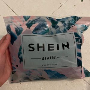 This is a SHEIN bathing suit. It’s a large and emerald green.